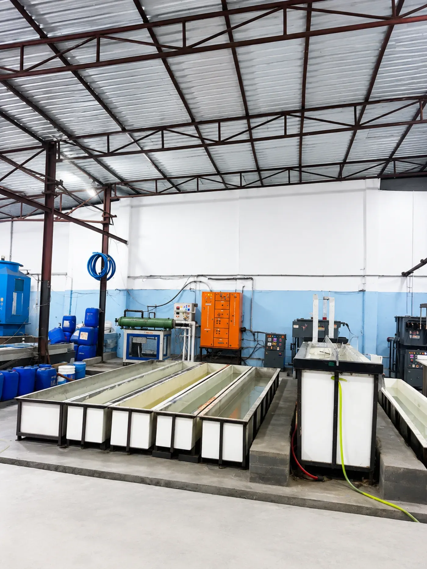 Aluminium plating and finishing facility with treatment tanks and equipment