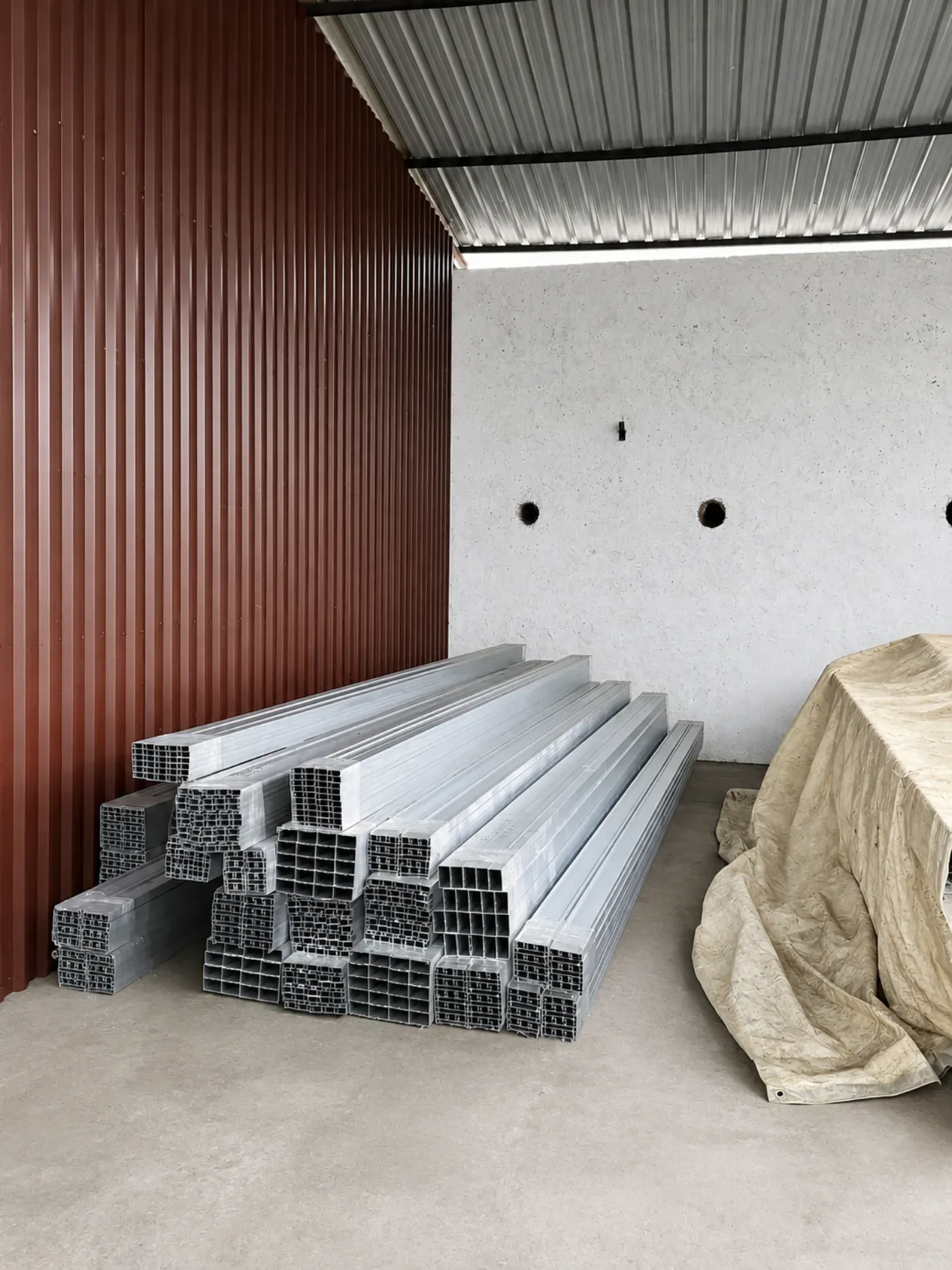 Aluminium profiles stored at the Shree Balaji Anodies facility
